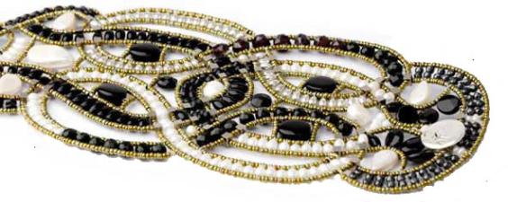 Very wide, high-fashion Ziio bracelet made with white pearls and black tourmaline